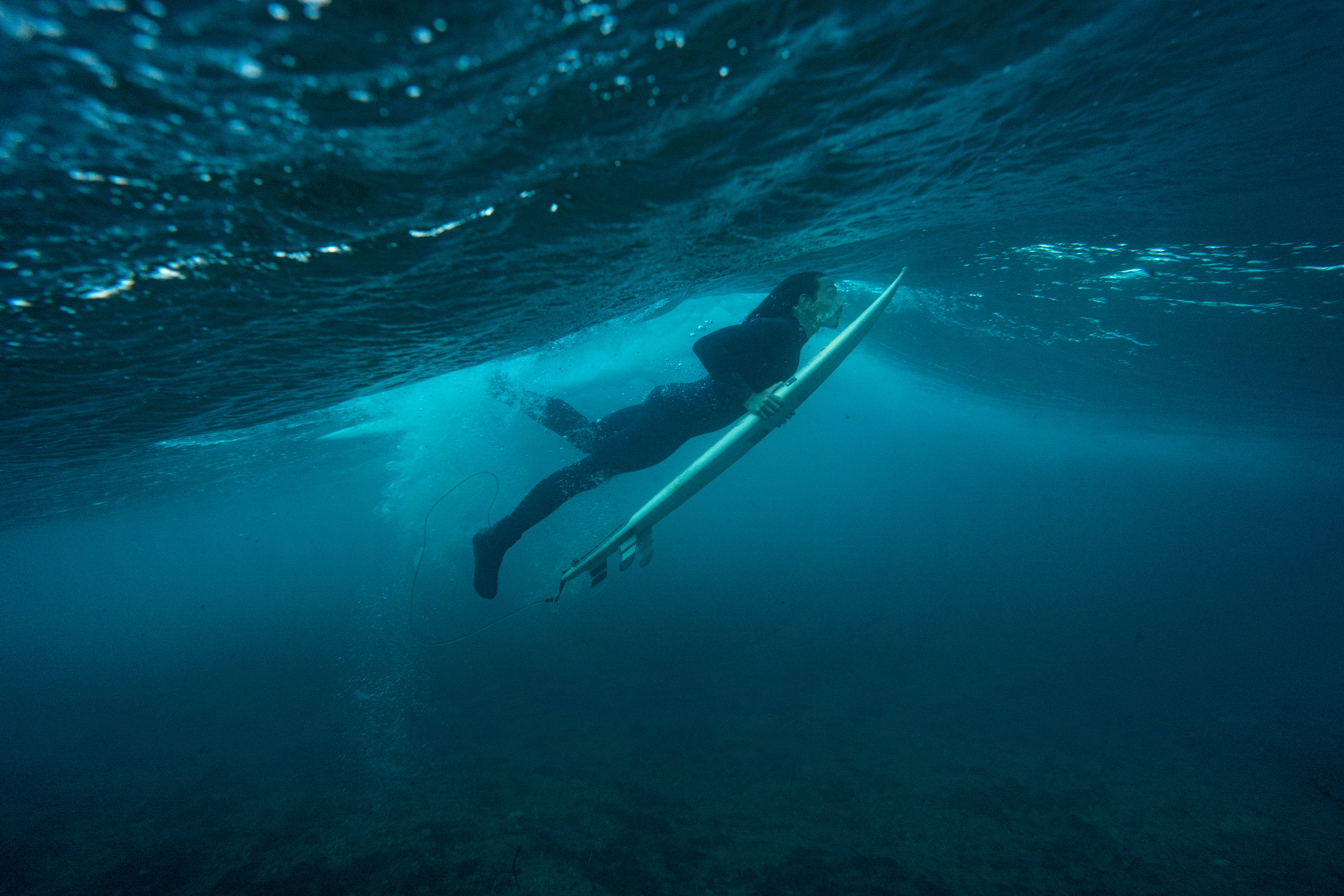 Valerio duck diving underwater