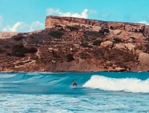 Surfer surfing wave in Riviera