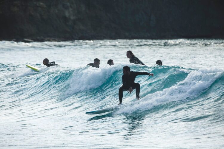 Surfer surfing waves in Riviera Malta