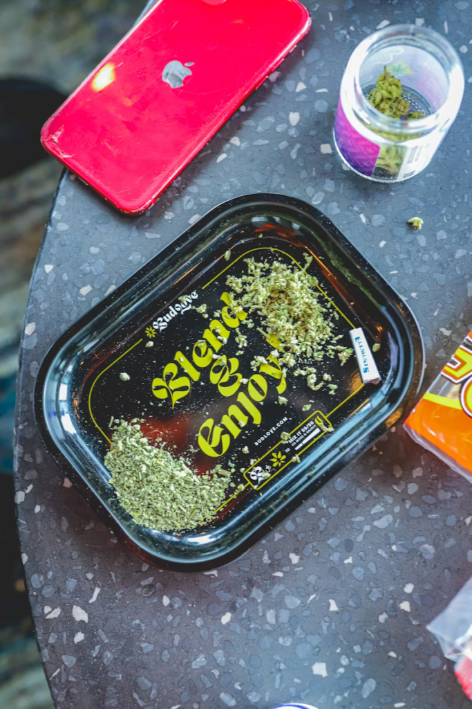 A weed tray with weed, a filter.
