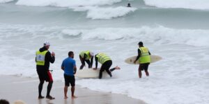 Injured surfer with emergency crew at Bells Beach.