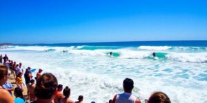Surfers competing on waves at Punta Roca, El Salvador.