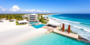 Luxury surf resort, Mexican coast, palm trees, ocean.