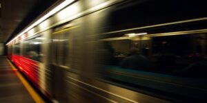 Subway car, blurred motion, city lights.