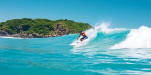 Surfer rides a large wave at Punta Roca