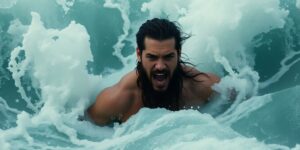 Jason Momoa in rough ocean waves.