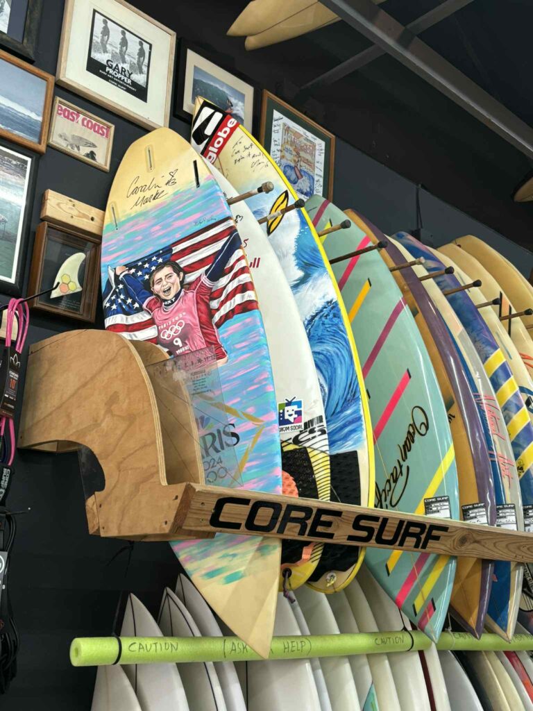 Surf boards on a rack in a surf shop