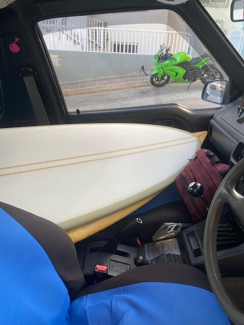 Surfboard in car