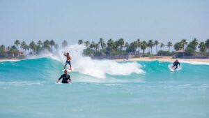 Surfers riding waves in the Philippines