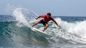 John John Florence surfing a large wave