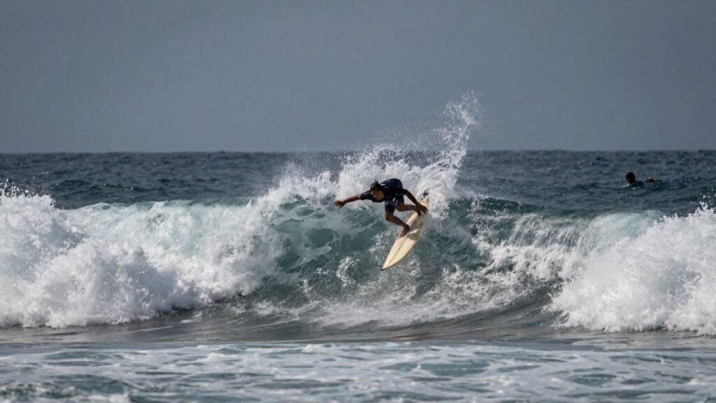 Surfers conquer giant waves at the TUDOR Nazaré Big Wave Challenge.