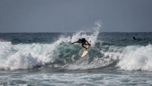 Surfers conquer giant waves at the TUDOR Nazaré Big Wave Challenge.