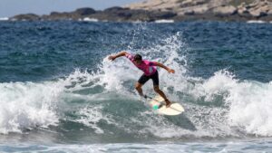 Surfer riding a wave at Corona Cero Surf Open Cerritos.
